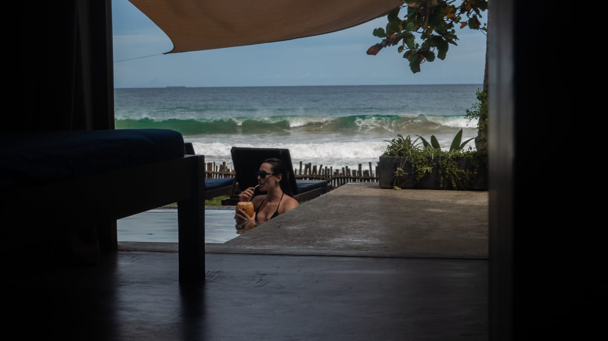 In the infinity pool, facing the breaking waves
